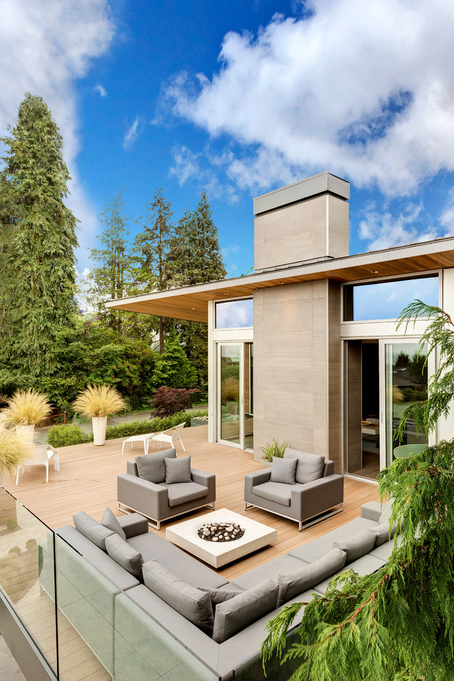 Inspiration for a contemporary deck in Vancouver with a fire feature and no cover.