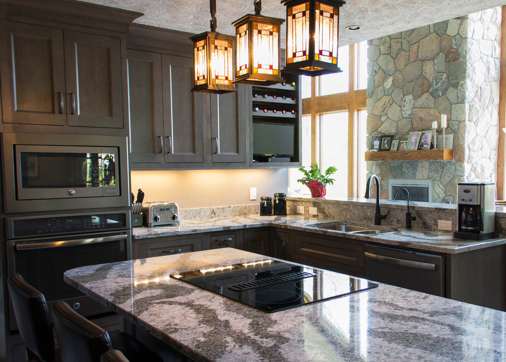 Eat-in kitchen - large transitional u-shaped marble floor eat-in kitchen idea with an undermount sink, flat-panel cabinets, quartz countertops, stainless steel appliances and an island