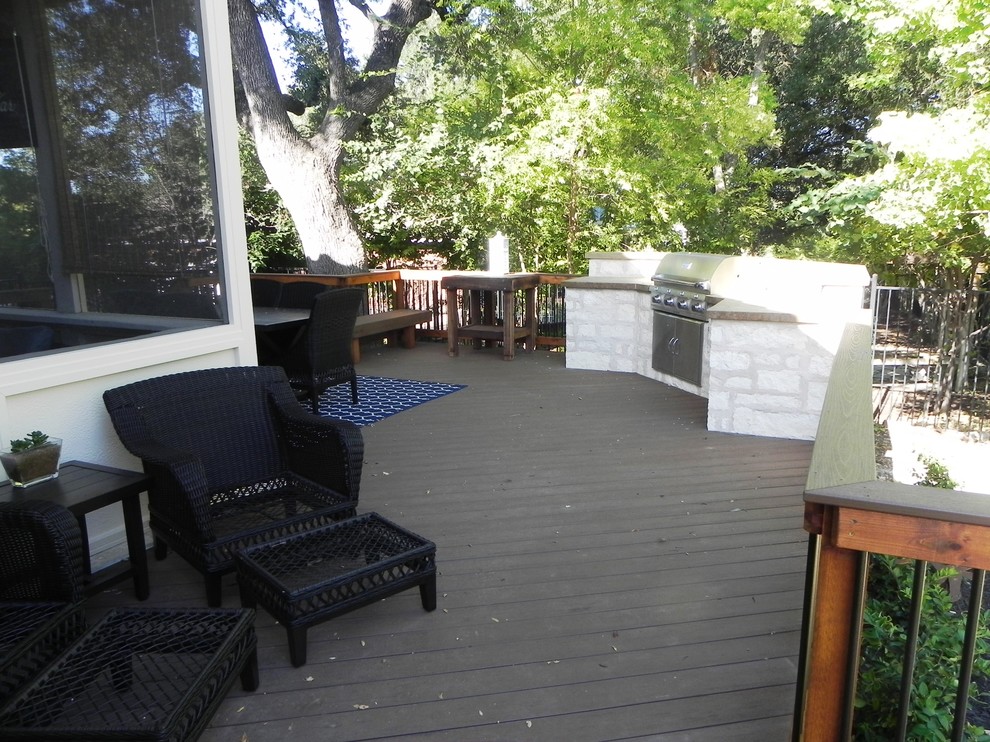 Large transitional backyard deck photo in Austin with no cover