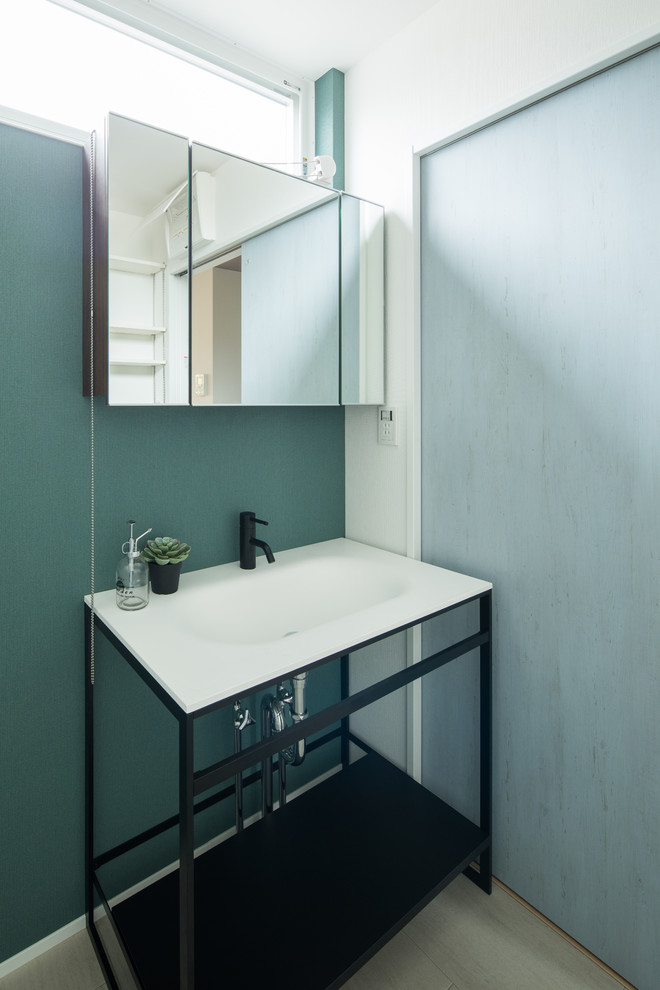 Photo of an industrial powder room in Other.