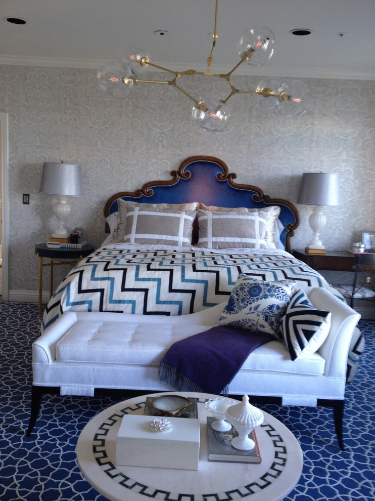Photo of a large transitional master bedroom in San Francisco with grey walls, carpet, no fireplace and blue floor.