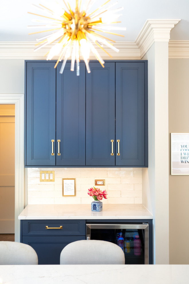 Navy Beverage Center With Brass Hardware & Textured Backsplash