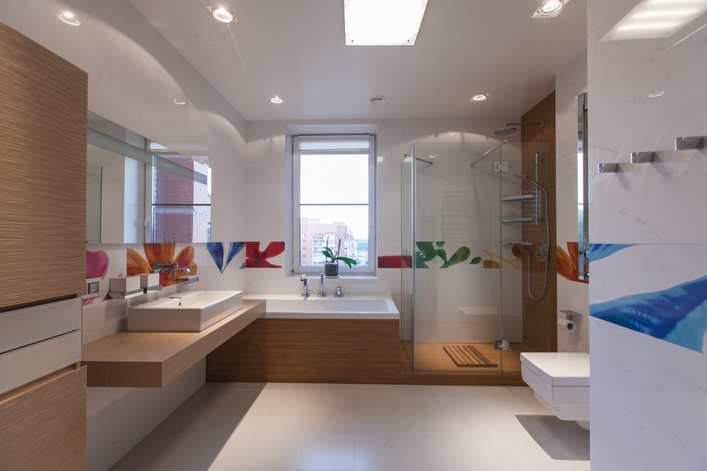 Photo of a large contemporary 3/4 bathroom in Saint Petersburg with open cabinets, light wood cabinets, an undermount tub, an open shower, a wall-mount toilet, white tile, porcelain tile, white walls, porcelain floors, a vessel sink, wood benchtops, white floor, a shower curtain and brown benchtops.