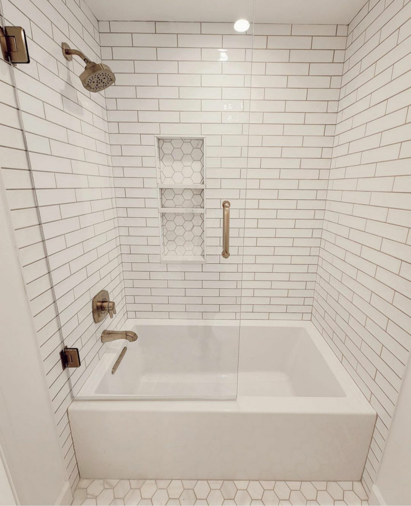 Photo of a small transitional 3/4 bathroom in Atlanta with recessed-panel cabinets, turquoise cabinets, an alcove tub, a shower/bathtub combo, a two-piece toilet, white tile, ceramic tile, white walls, mosaic tile floors, an undermount sink, engineered quartz benchtops, white floor, a hinged shower door, white benchtops, a double vanity and a built-in vanity.