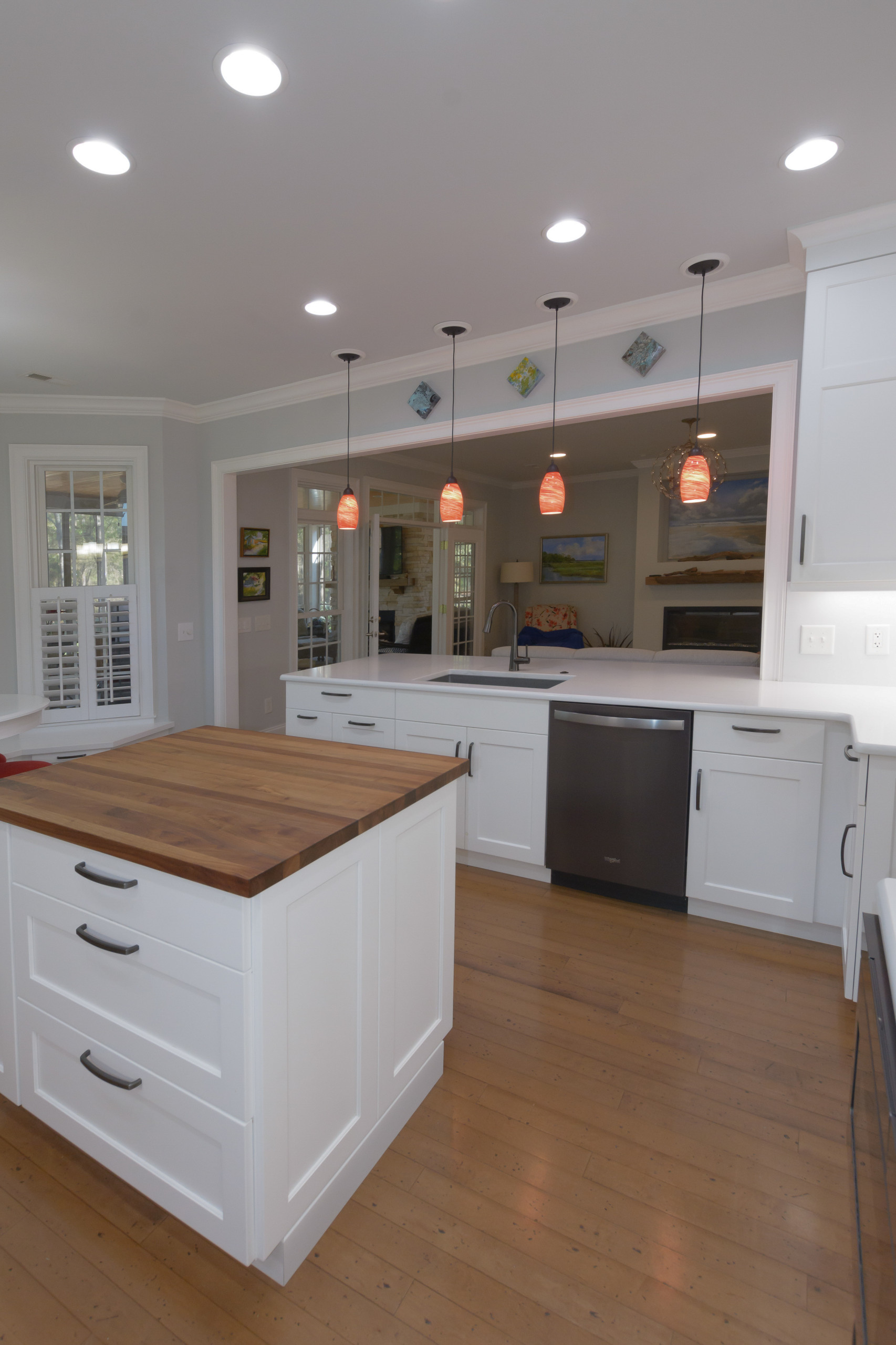 Pawley's Island modern white kitchen with butcher block island