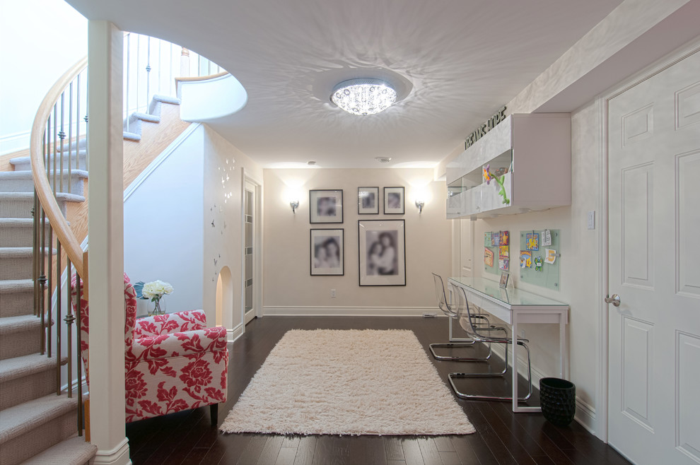 Design ideas for a contemporary kids' study room for girls in Ottawa with white walls and dark hardwood floors.
