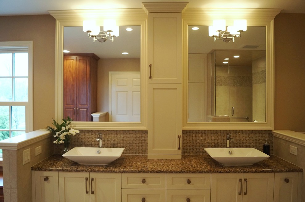 Design ideas for a transitional master bathroom in Philadelphia with granite benchtops and travertine floors.