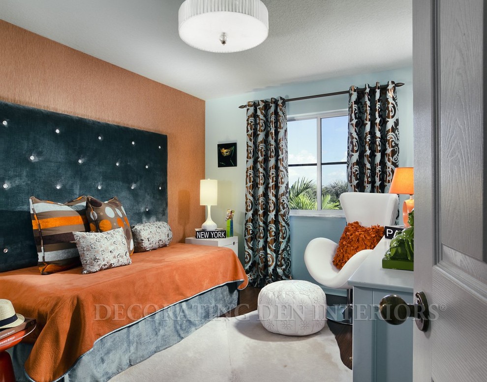 Mid-sized modern guest bedroom in Los Angeles with orange walls and carpet.