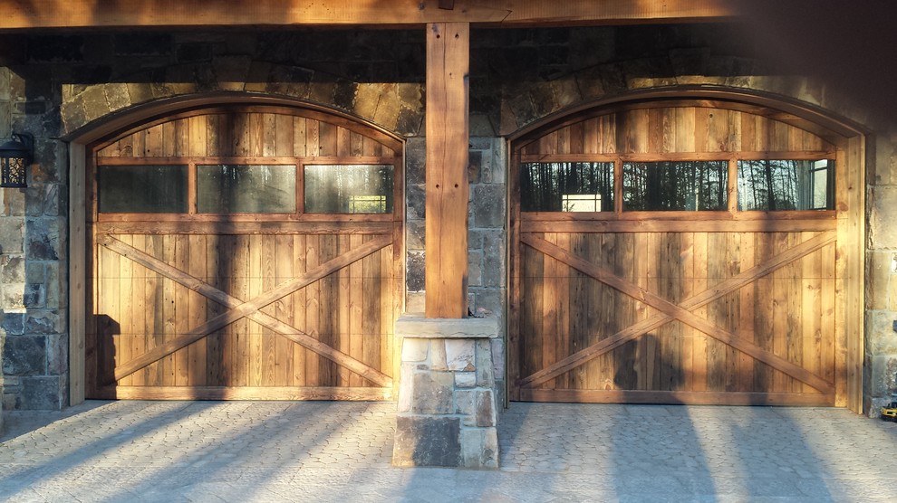 Garage - mid-sized rustic attached two-car garage idea