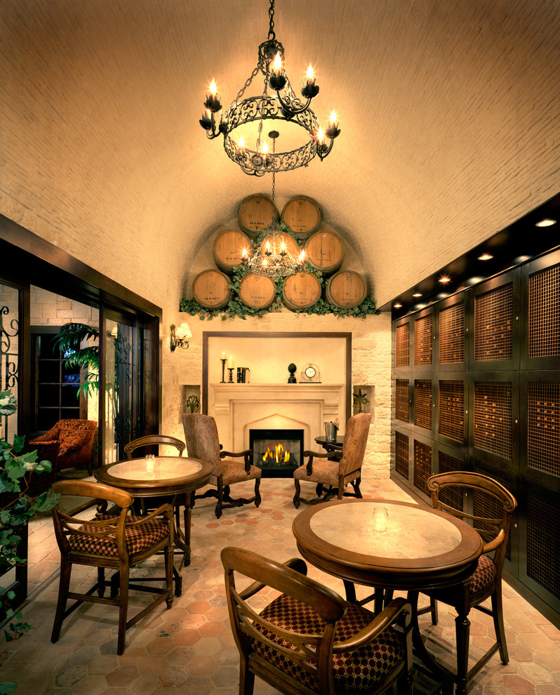 Large traditional wine cellar in Other with terra-cotta floors, display racks and red floor.