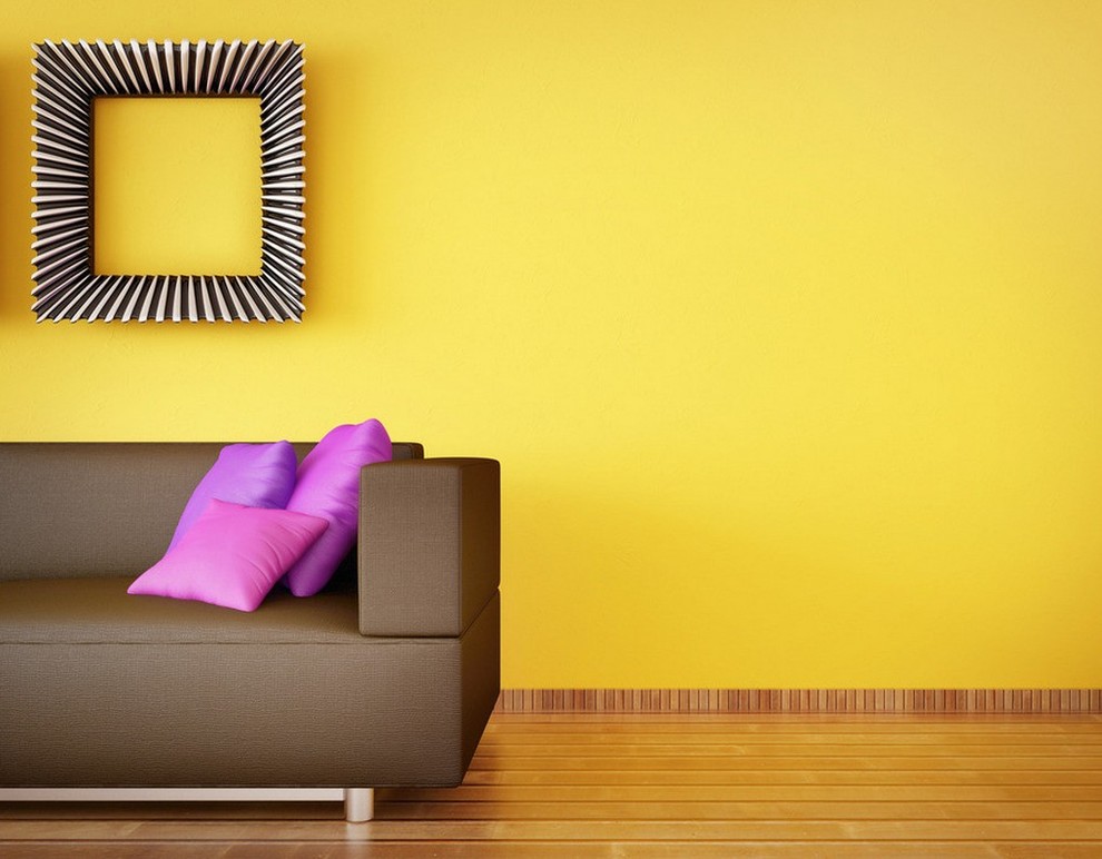 Example of a small trendy open concept and formal light wood floor and brown floor living room design with yellow walls, no fireplace and no tv