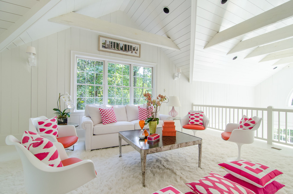Photo of a transitional living room in Atlanta with white walls.