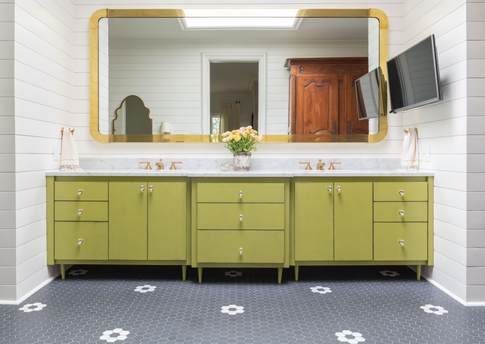 Example of a large transitional master porcelain tile, double-sink, shiplap wall and gray floor doorless shower design in Austin with flat-panel cabinets, green cabinets, white walls, an undermount sink, marble countertops, white countertops and a built-in vanity