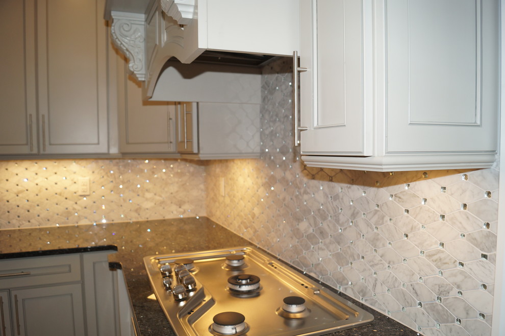 Example of a transitional kitchen design in New York