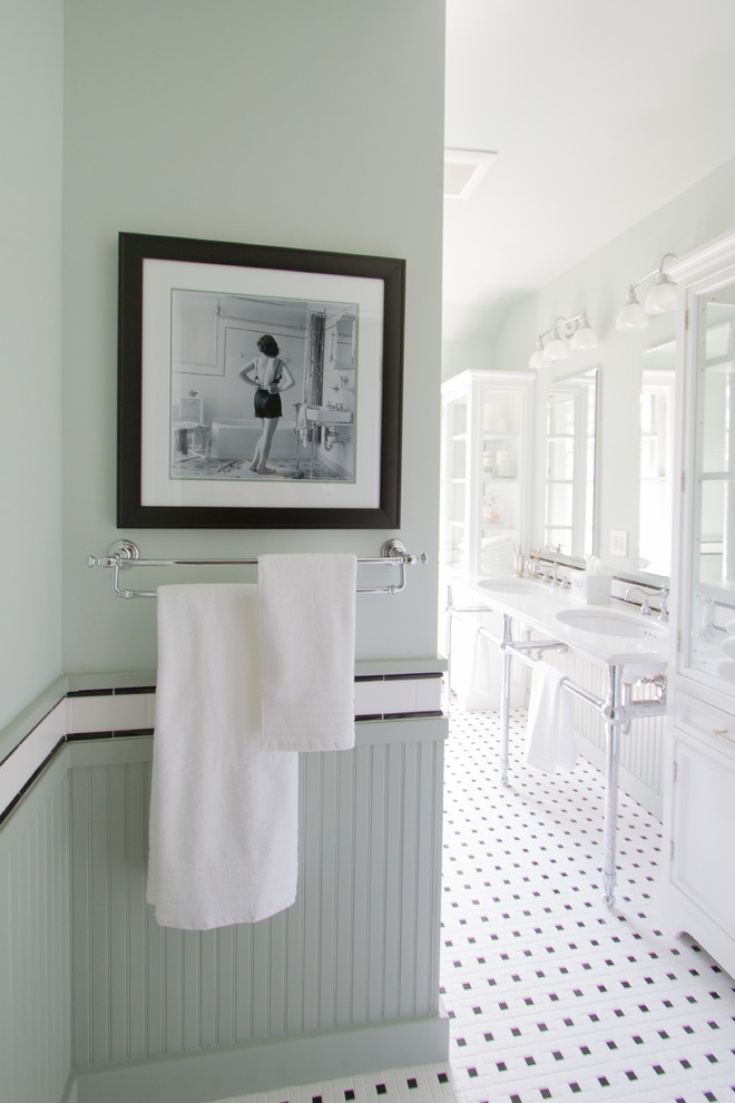 Inspiration for a small transitional kids bathroom in Other with a console sink, beaded inset cabinets, white cabinets, engineered quartz benchtops, a drop-in tub, a shower/bathtub combo, a two-piece toilet, white tile, ceramic tile, green walls and mosaic tile floors.