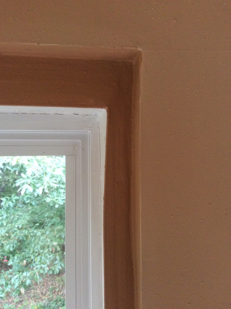 Trim ideas to hide bad drywall job on windows!
