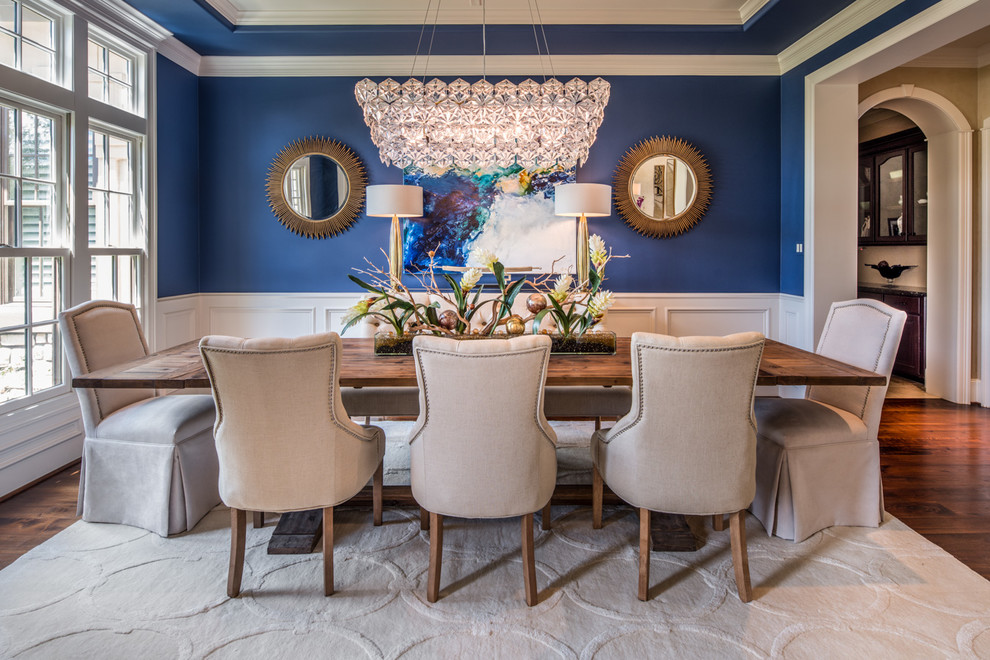 Large transitional separate dining room in Houston with blue walls, brown floor, no fireplace and dark hardwood floors.