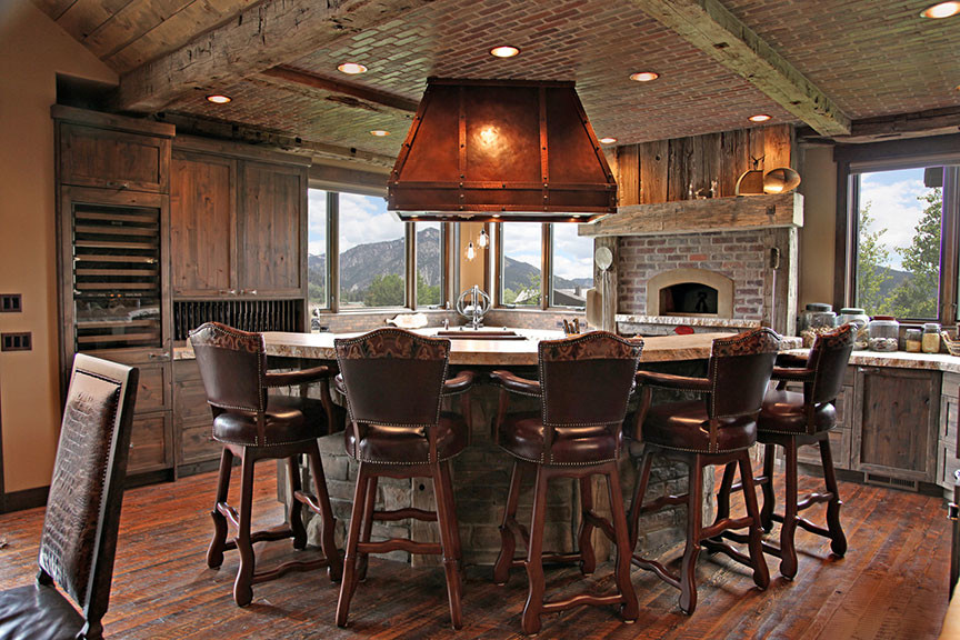 Eat-in kitchen - large rustic u-shaped dark wood floor and brown floor eat-in kitchen idea with shaker cabinets, dark wood cabinets and an island