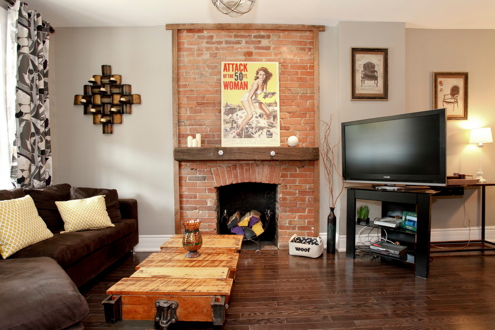 Eclectic living room in Other with a brick fireplace surround.