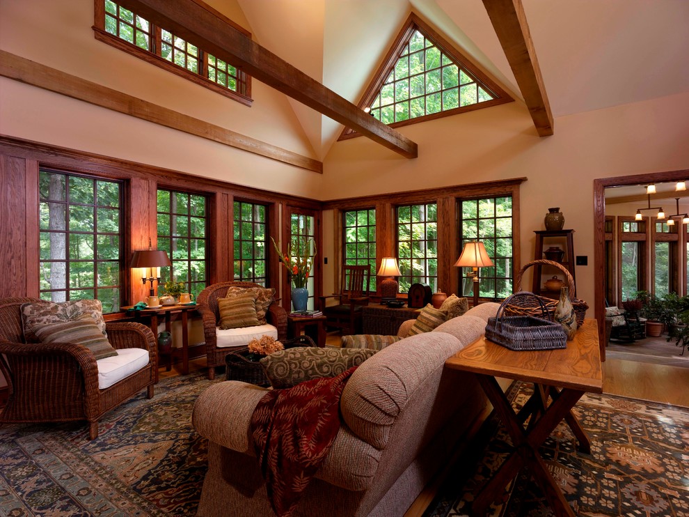 Inspiration for a traditional open concept family room in New York with medium hardwood floors.
