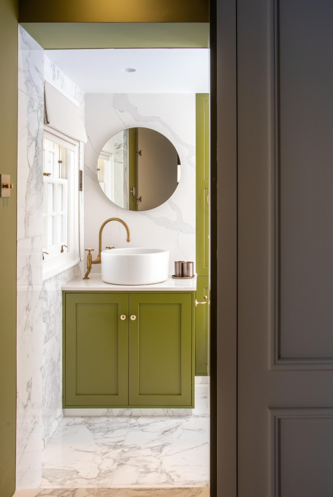 Design ideas for a large contemporary master bathroom in London with shaker cabinets, green cabinets, an open shower, a wall-mount toilet, white tile, marble, green walls, marble floors, a vessel sink, marble benchtops, white floor, an open shower, white benchtops, a single vanity, a built-in vanity and panelled walls.