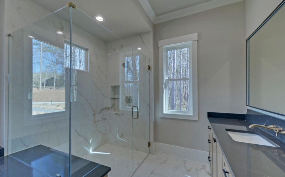 This is an example of a transitional bathroom in Atlanta with a single vanity.