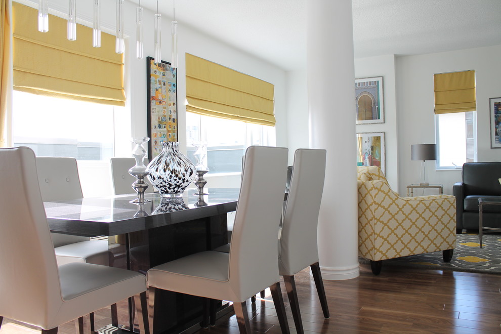This is an example of a contemporary dining room in Montreal.