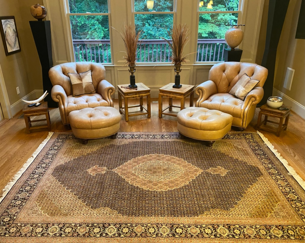 Living room design complete with traditional Persain Tabriz Rug! Traditional Living Room