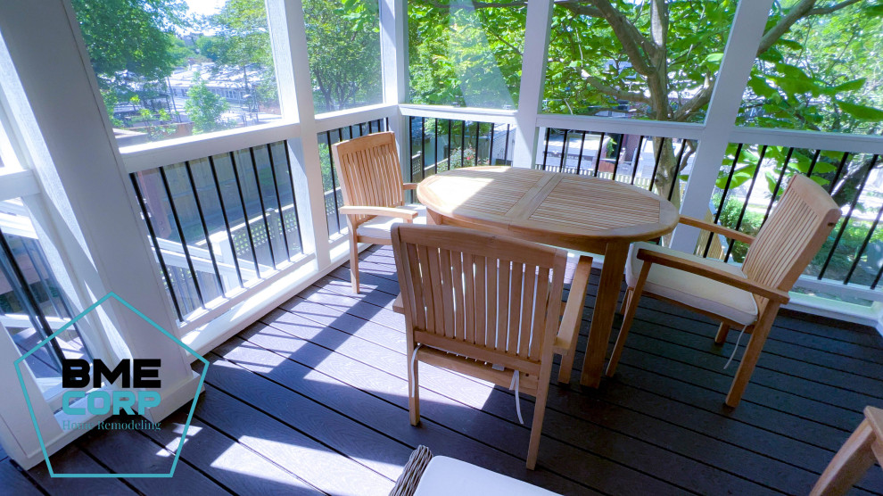 Mid-sized traditional backyard screened-in verandah in DC Metro with mixed railing.