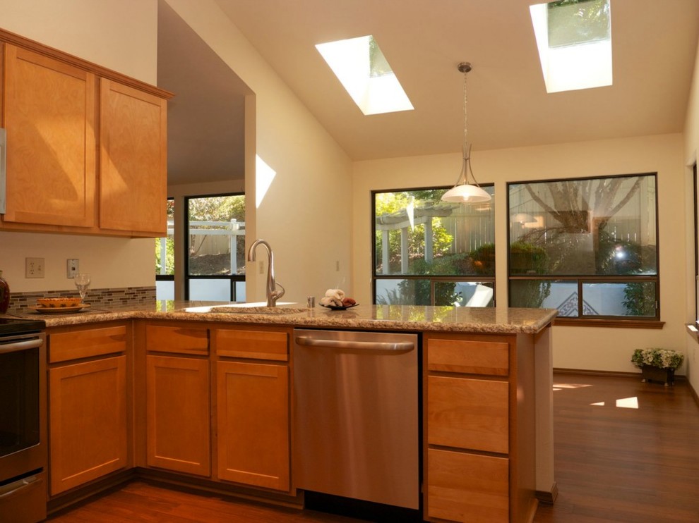 Example of a transitional kitchen design in Seattle