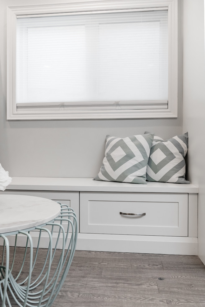 Example of a transitional home design design in Toronto