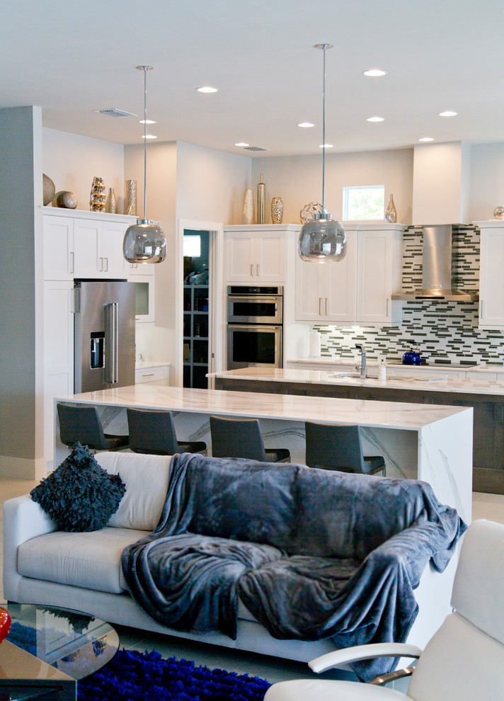 Inspiration for a large contemporary home design remodel in Miami