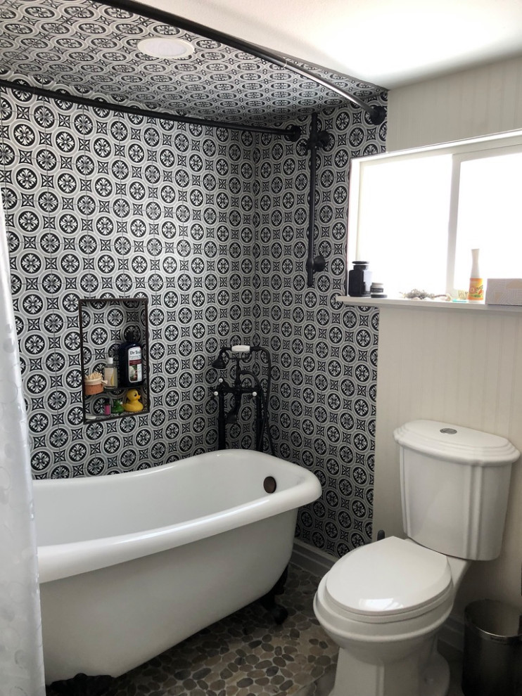 Photo of a small master wet room bathroom in Denver with raised-panel cabinets, white cabinets, a claw-foot tub, a two-piece toilet, multi-coloured tile, ceramic tile, blue walls, ceramic floors, an integrated sink, engineered quartz benchtops, multi-coloured floor, a hinged shower door, white benchtops, a shower seat, a single vanity, a freestanding vanity and planked wall panelling.