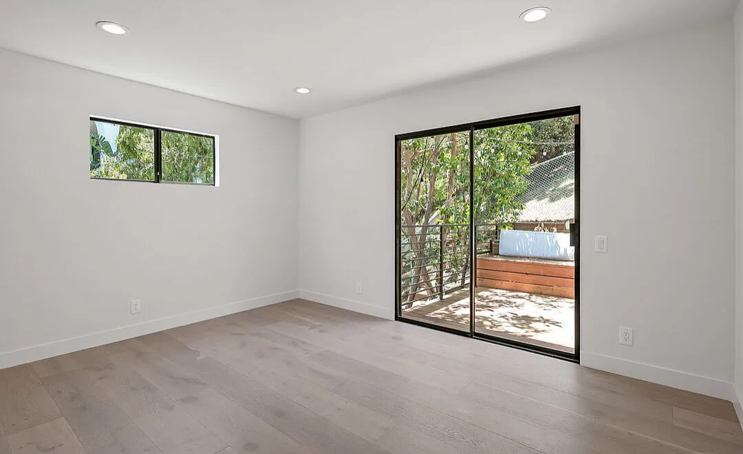 Guest Bedroom with Access to the Balcony