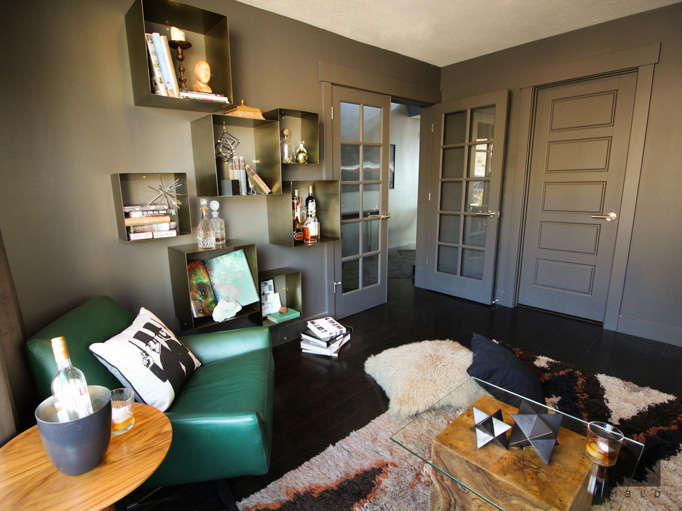 Example of a small minimalist enclosed dark wood floor living room library design in Salt Lake City with gray walls and no tv