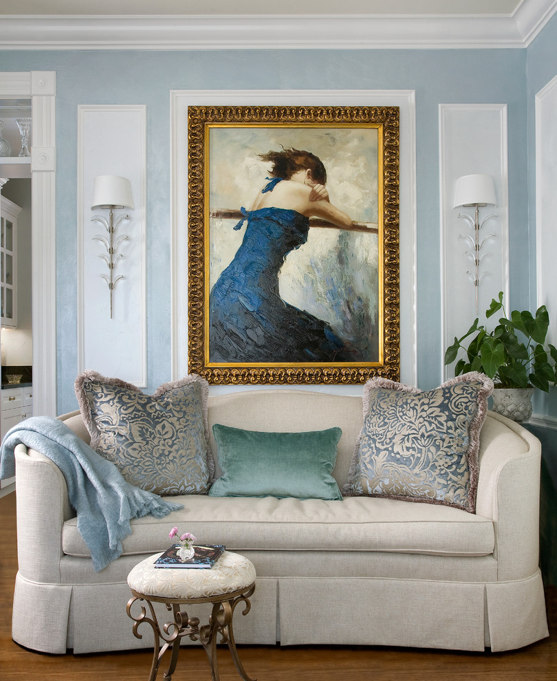 Inspiration for a timeless medium tone wood floor living room remodel in Denver with blue walls