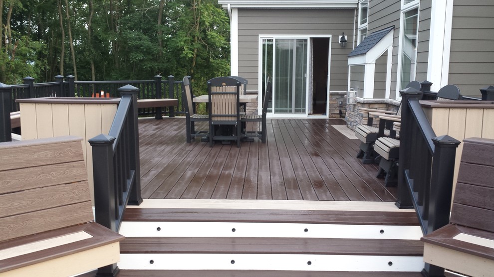Deck - large modern backyard deck idea with a fire pit and no cover