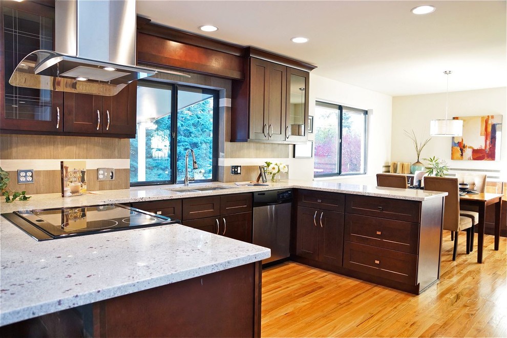 Example of a transitional kitchen design in Denver