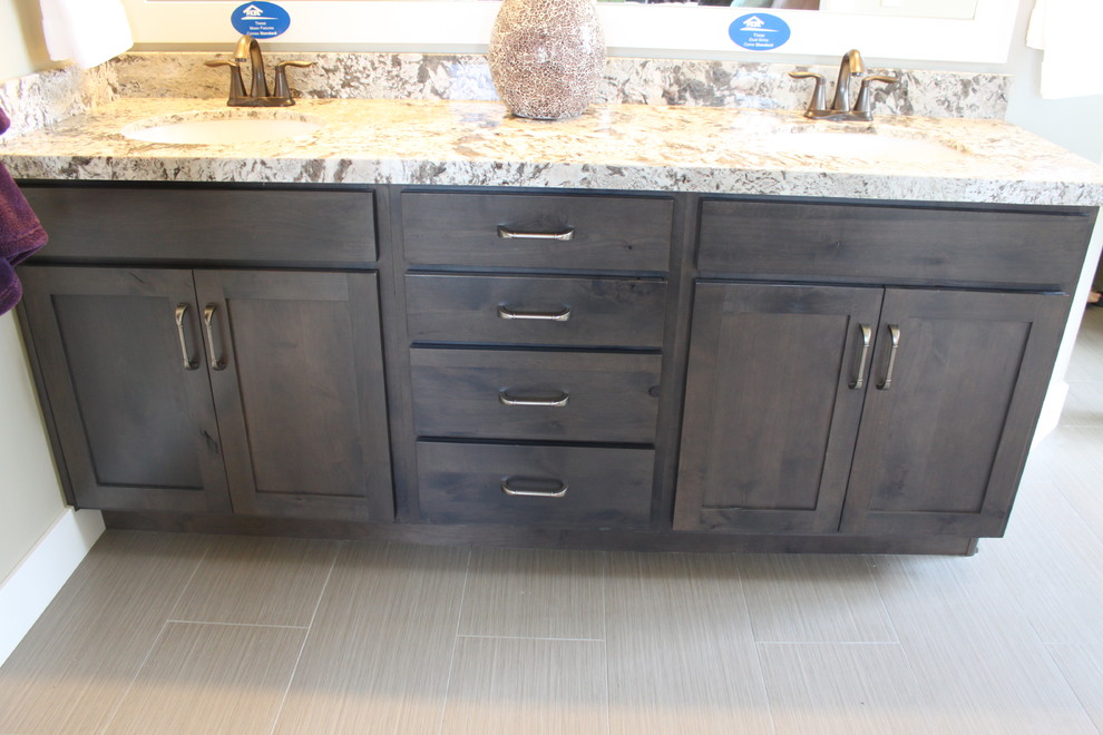 Design ideas for a traditional bathroom in Salt Lake City with shaker cabinets and dark wood cabinets.