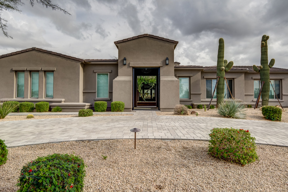 Inspiration for a transitional exterior home remodel in Phoenix
