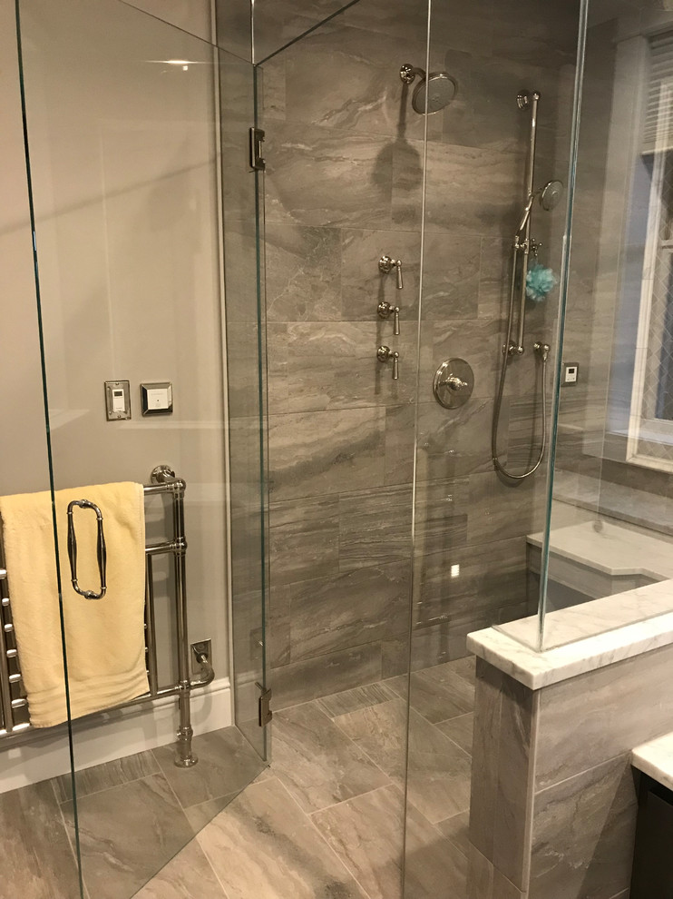 Small traditional master bathroom in Bridgeport with recessed-panel cabinets, dark wood cabinets, an alcove tub, a corner shower, brown tile, porcelain tile, grey walls, porcelain floors, an undermount sink, granite benchtops, beige floor and a hinged shower door.