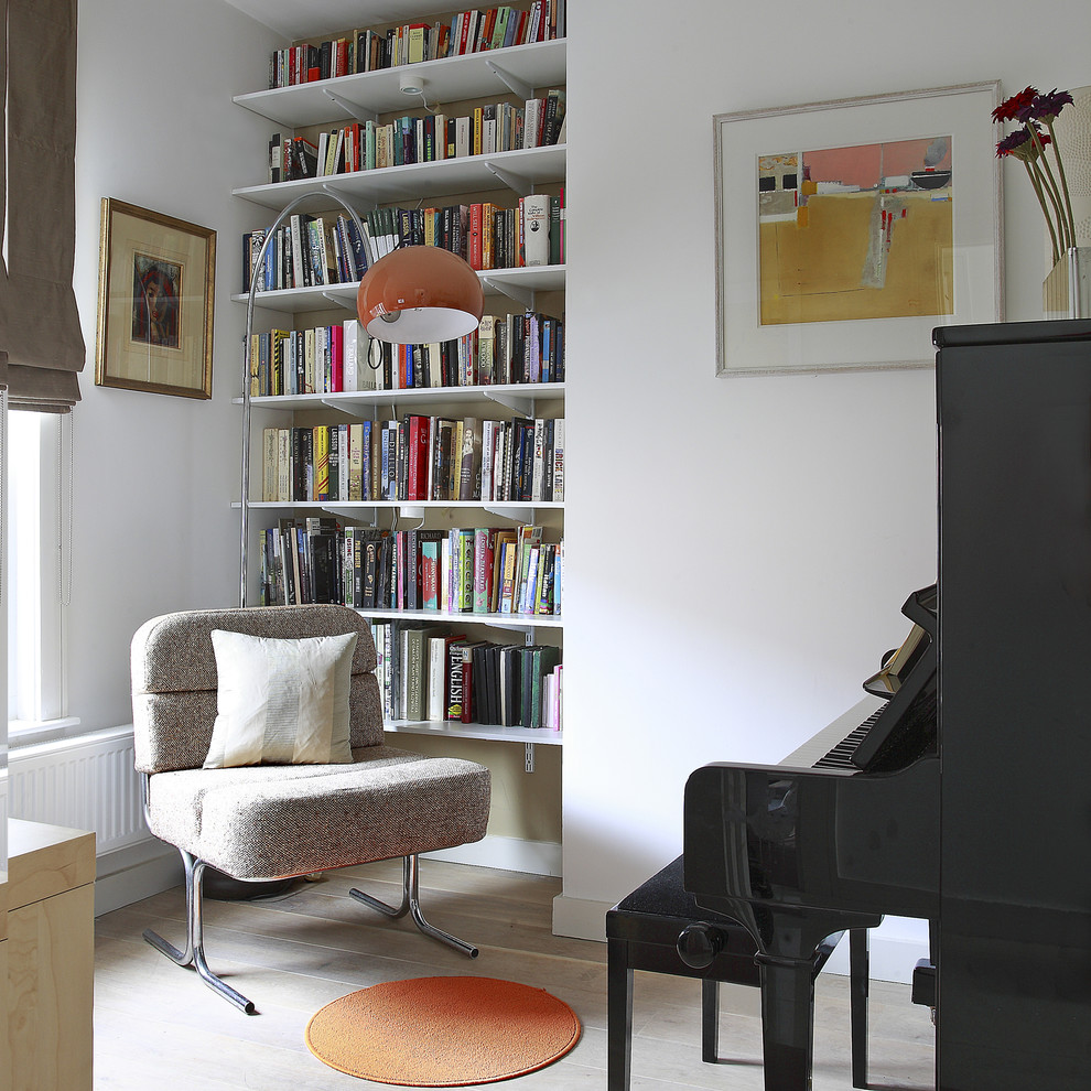 Small contemporary family room in Dublin with a music area.