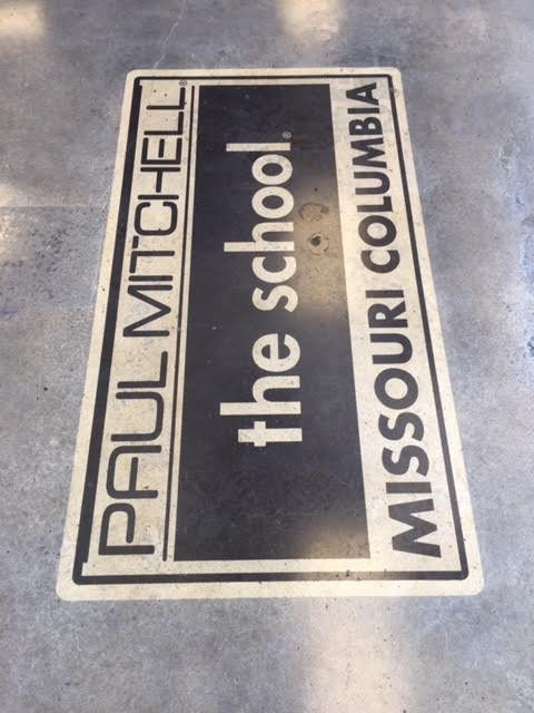 Epoxy floor and Paul Mitchell sign free hand designed