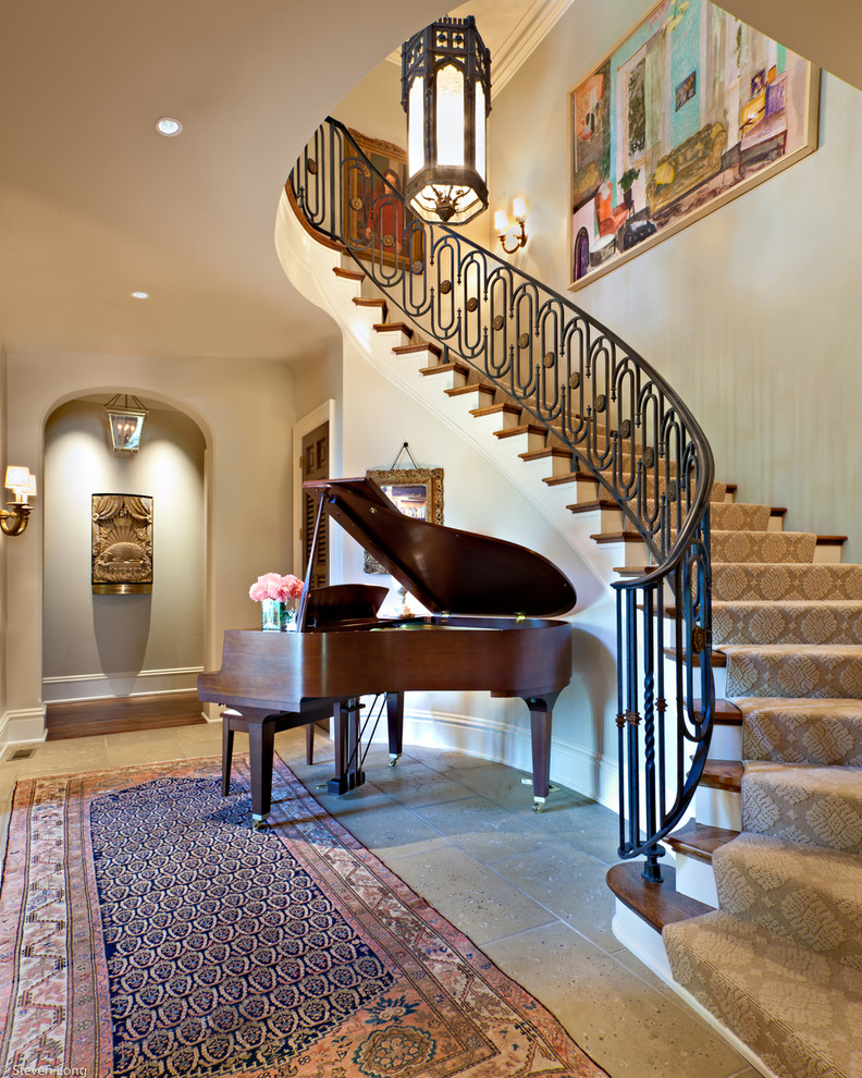 Photo of a traditional wood curved staircase in Nashville.