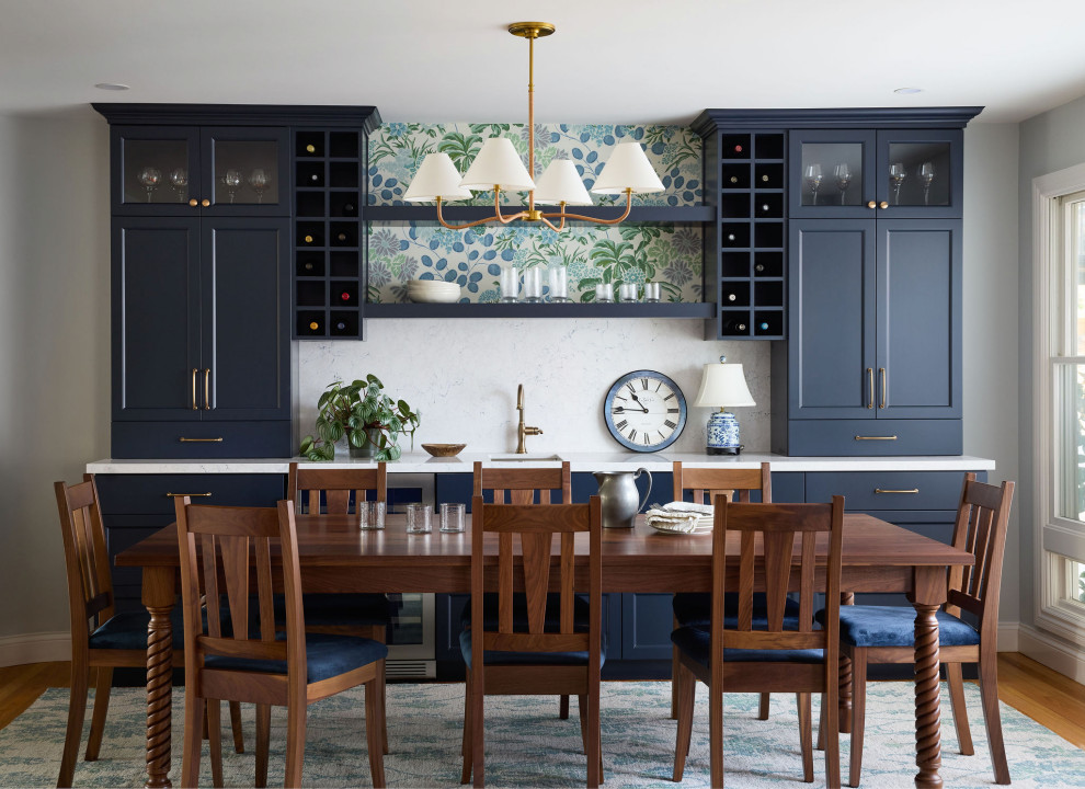 Large transitional medium tone wood floor, brown floor and wallpaper great room photo with blue walls