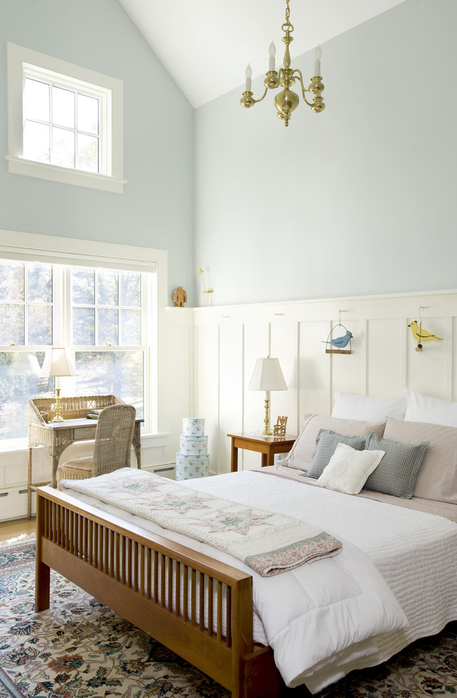 Inspiration for a traditional bedroom in Boston with blue walls.