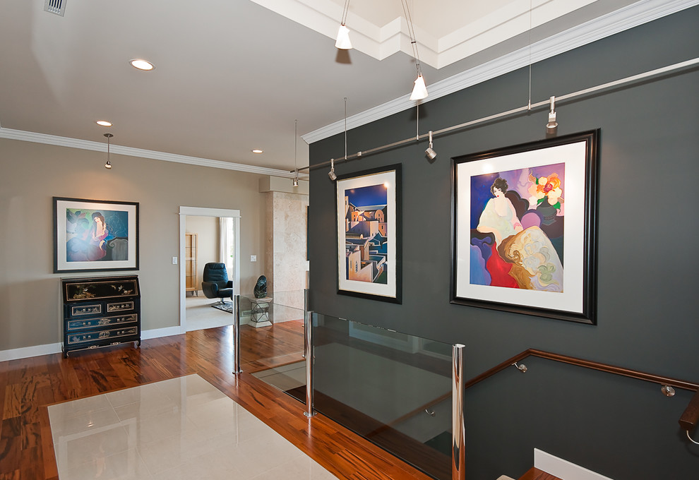 Entry hall - large transitional porcelain tile and multicolored floor entry hall idea with beige walls and a dark wood front door