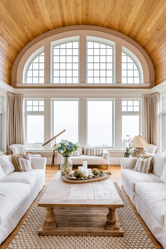 Beach style formal living room in Portland Maine with medium hardwood floors and no fireplace.