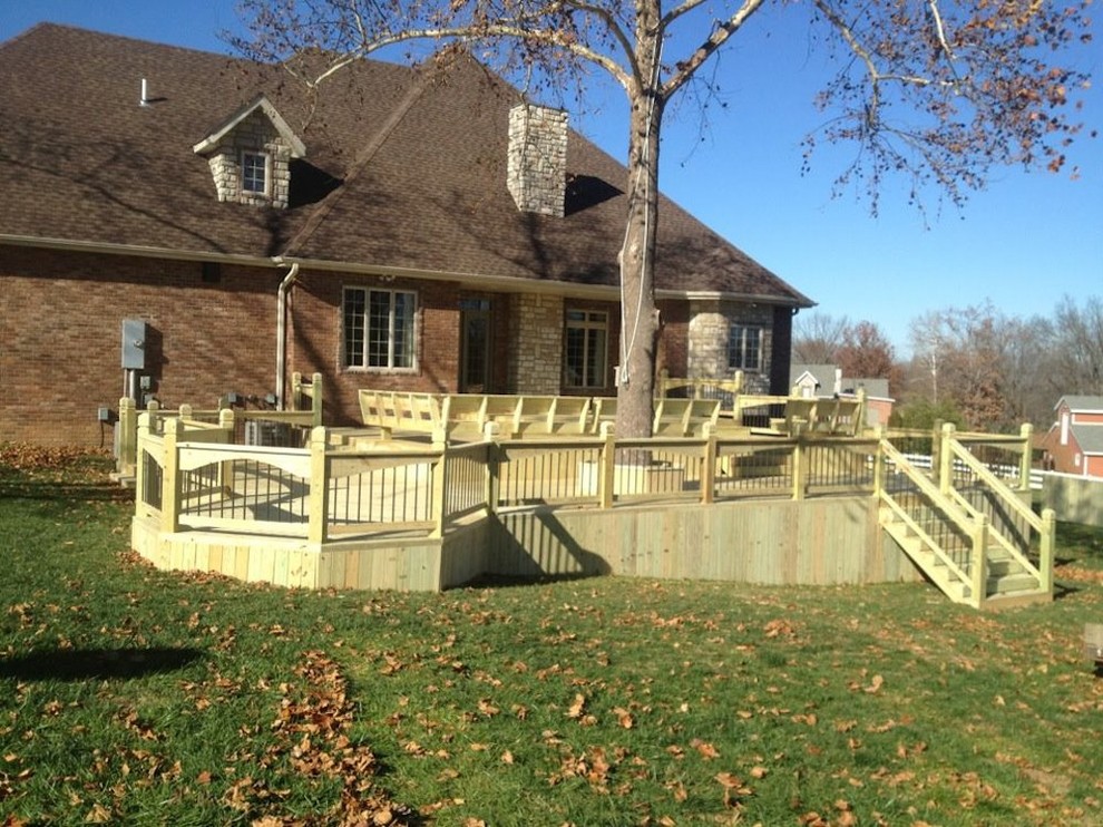 Large arts and crafts backyard balcony deck photo with no cover