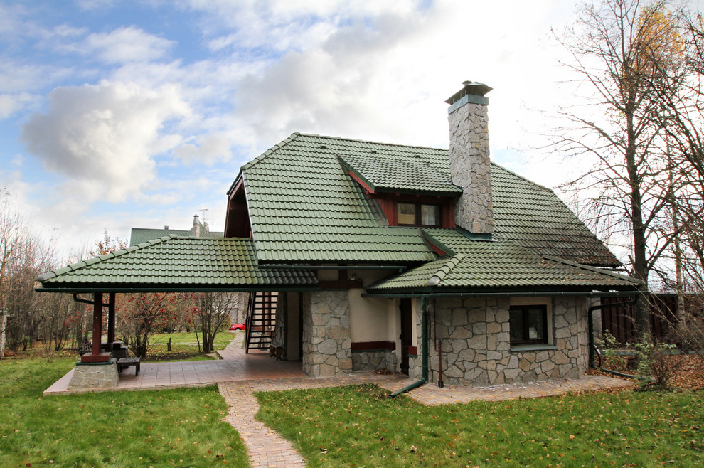 Country exterior in Moscow with stone veneer.
